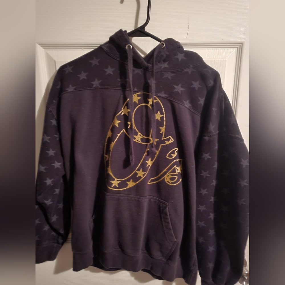 Orioles hoody used. Light cracking along print.